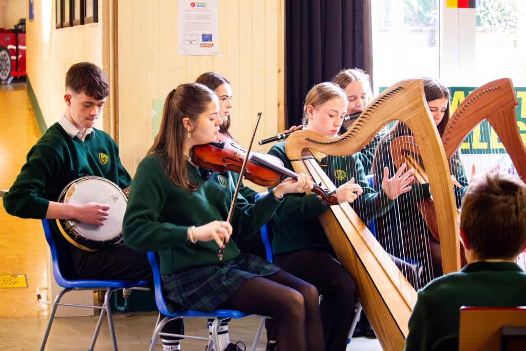 Traditional Irish musicians performing during Ambassador David Gill's visit